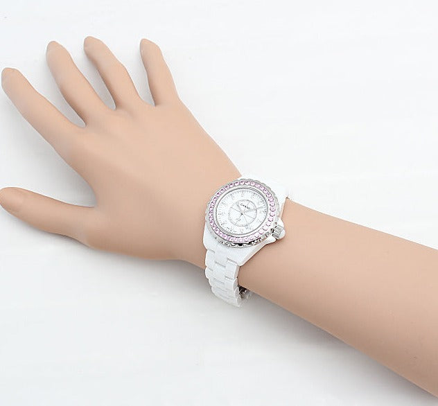  Shop Authentic Chanel J12 Sapphire Bezel Ceramic White Dial White Steel Strap Watch for Women - J12 H2010 - Luxxuri