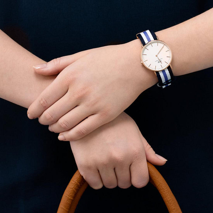  Shop Authentic Daniel Wellington Classic Trinity White Dial Three Tone Nylon Strap Watch For Women - 0509DW - Luxxuri