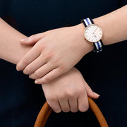  Shop Authentic Daniel Wellington Classic Trinity White Dial Three Tone Nylon Strap Watch For Women - 0509DW - Luxxuri