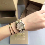  Shop Authentic Burberry The City Gold Dial Gold Steel Strap Watch for Women - BU9145 - Luxxuri