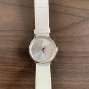  Shop Authentic Calvin Klein Accent Silver Dial White Leather Strap Watch for Women - K2Y2X1K6 - Luxxuri