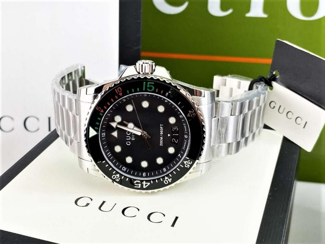  Shop Authentic Gucci Dive Analog Black Dial Silver Steel Strap Watch For Men - YA136208 - Luxxuri