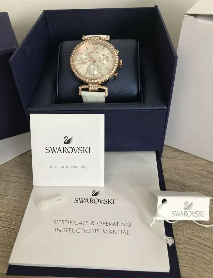  Shop Authentic Swarovski Era Journey Silver Dial White Leather Strap Watch for Women - 5295369 - Luxxuri