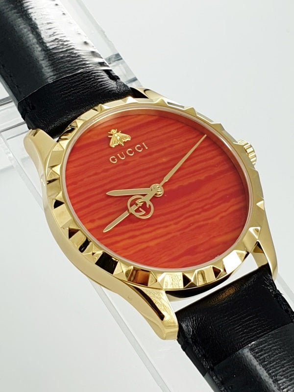 Shop Authentic Gucci G Timeless Coral Red Dial Black Leather Strap Watch For Men - YA126464 - Luxxuri