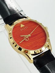  Shop Authentic Gucci G Timeless Coral Red Dial Black Leather Strap Watch For Men - YA126464 - Luxxuri