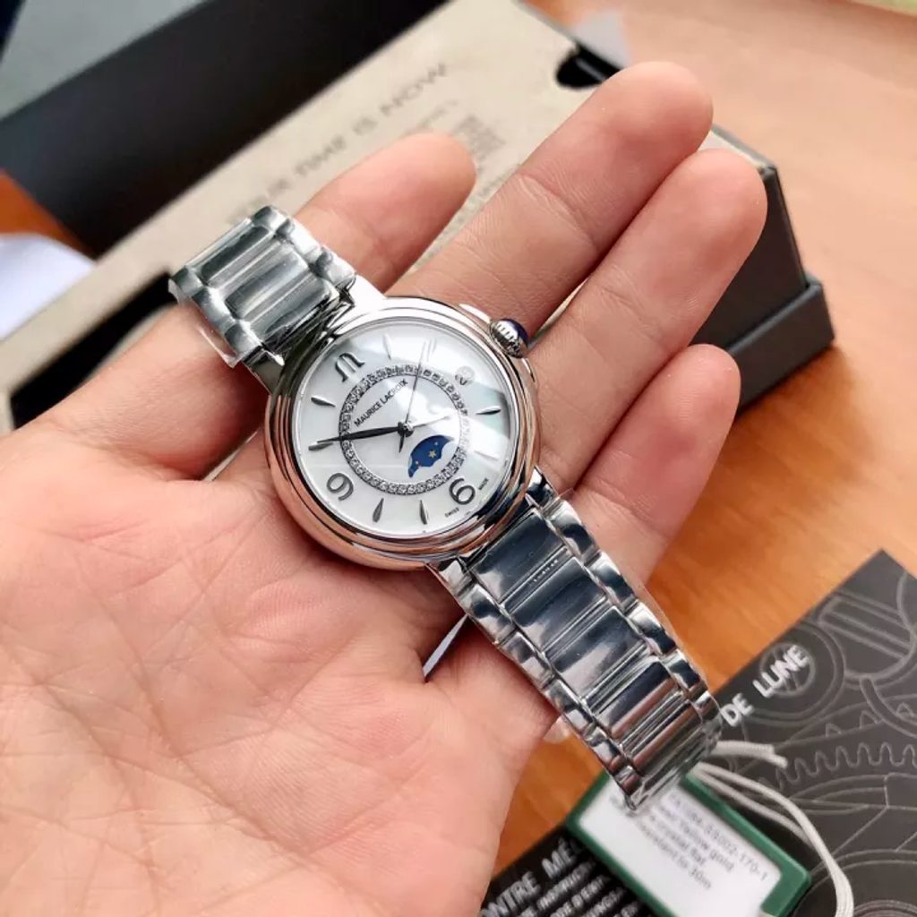  Shop Authentic Maurice Lacroix Fiaba Moonphase White Mother of Pearl Dial Silver Steel Strap Watch for Women - FA1084-SS002-170-1 - Luxxuri