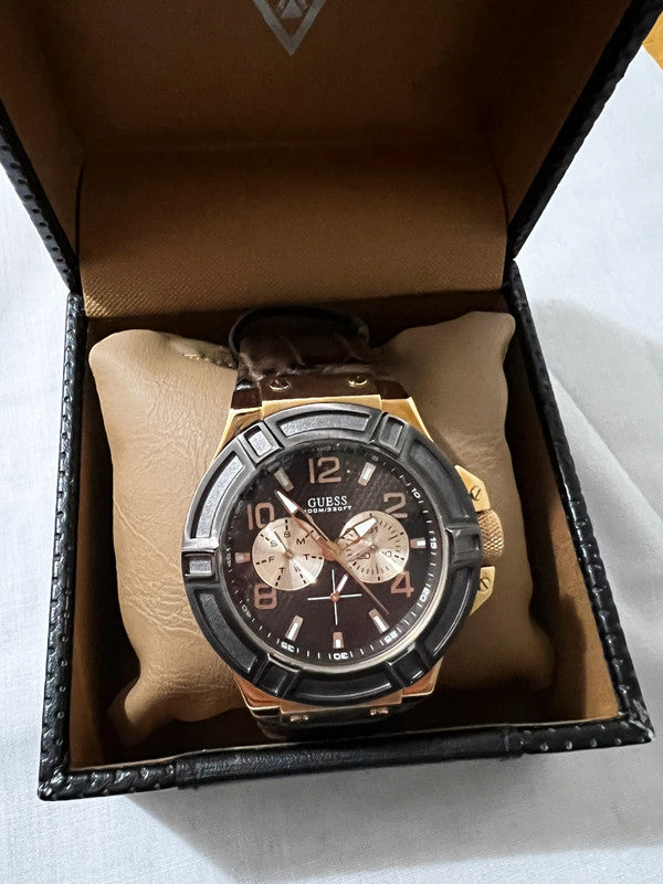  Shop Authentic Guess Rigor Analog Brown Dial Brown Leather Strap Watch For Men - W0040G3 - Luxxuri