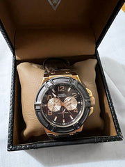  Shop Authentic Guess Rigor Analog Brown Dial Brown Leather Strap Watch For Men - W0040G3 - Luxxuri