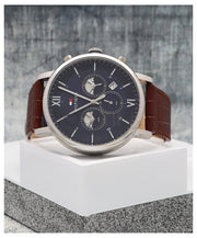 Shop Authentic Tommy Hilfiger Evan Chronograph Blue Dial Brown Leather Strap Watch for Men - 1710393 - Luxxuri
