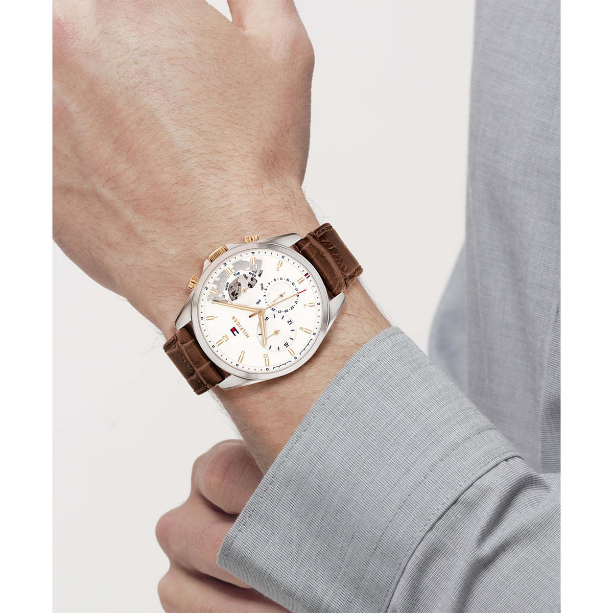  Shop Authentic Tommy Hilfiger Baker Chronograph White Dial Brown Leather Strap Watch For Men - 1710450 - Luxxuri