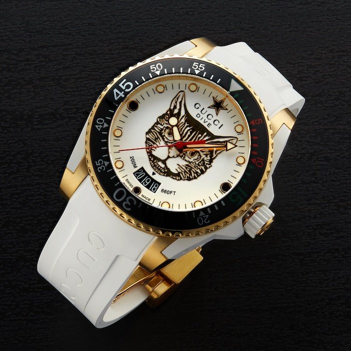  Shop Authentic Gucci Dive Quartz White Dial White Rubber Strap Unisex Watch - YA136322 - Luxxuri