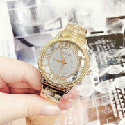  Shop Authentic Guess Analog Diamonds Silver Dial Gold Steel Strap Watch For Women - W1013l2 - Luxxuri