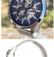  Shop Authentic Tommy Hilfiger Spencer Skeleton Black Dial Silver Mesh Bracelet Watch for Men - 1791643 - Luxxuri