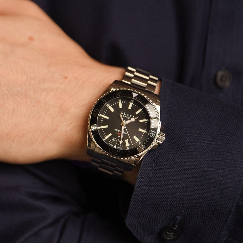 Shop Authentic Gucci Dive Quartz Black Dial Silver Steel Strap Watch For Men - YA136301 - Luxxuri