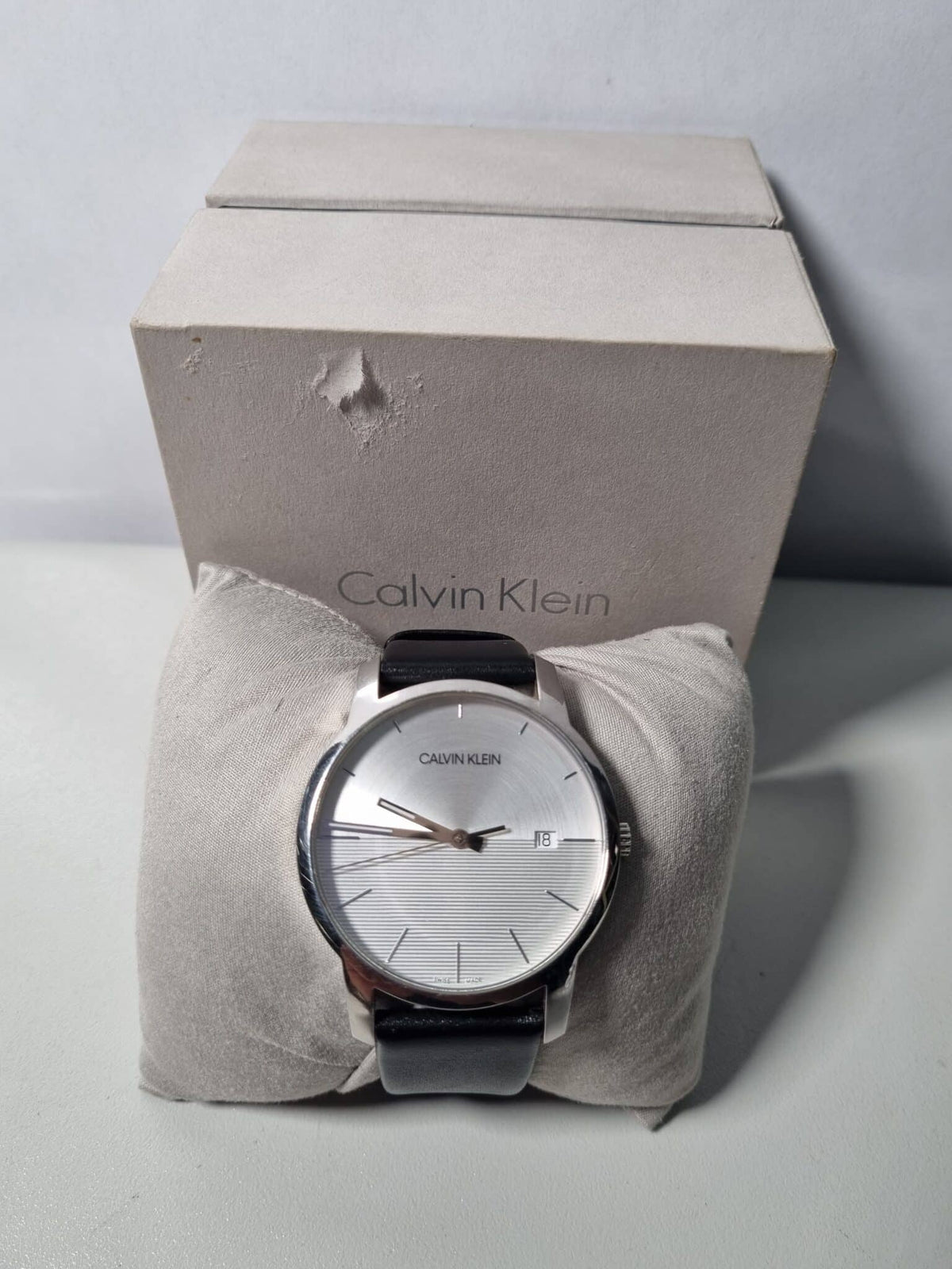  Shop Authentic Calvin Klein City White Dial Black Leather Strap Watch for Men - K2G2G1CD - Luxxuri