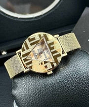  Shop Authentic Guess Iconic Quartz Gold Dial Gold Mesh Bracelet Watch For Women - GW0527L2 - Luxxuri