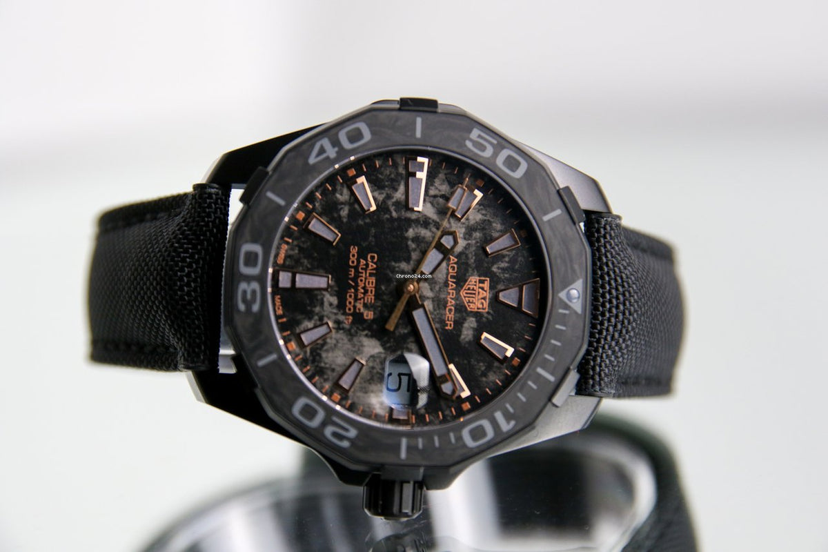  Shop Authentic Tag Heuer Aquaracer Calibre 5 Black NATO Strap Carbon Dial Watch for Men - WBD218A.FC6445 - Luxxuri