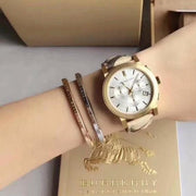  Shop Authentic Burberry The City White Dial Haymarket Beige Leather Strap Watch for Women - BU9752 - Luxxuri