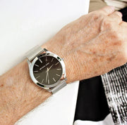  Shop Authentic Michael Kors Slim Runway Analog Black Dial Silver Mesh Bracelet Watch For Men - MK8606 - Luxxuri