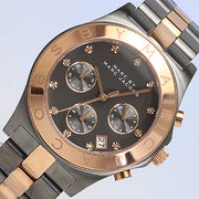 Shop Authentic Marc Jacobs Blade Chronograph Grey Dial Two Tone Steel Strap Watch for Women - MBM8583 - Luxxuri