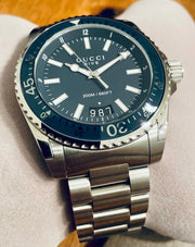  Shop Authentic Gucci Dive Analog Blue Dial Silver Steel Strap Watch For Men - YA136203 - Luxxuri