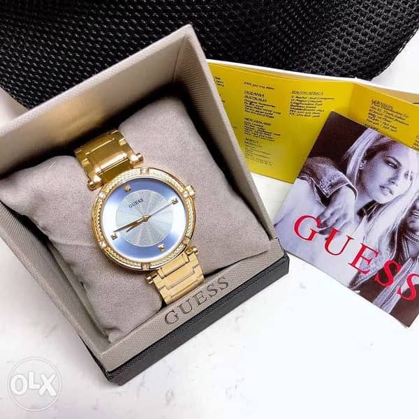  Shop Authentic Guess Park Avenue Blue Dial Gold Steel Strap Watch For Women - W0695L2 - Luxxuri