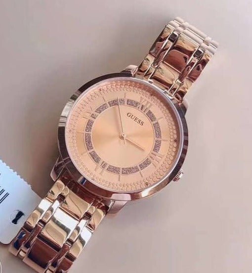  Shop Authentic Guess Montauk Rose Gold Dial Rose Gold Steel Strap Watch For Women - W0933L3 - Luxxuri