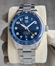  Shop Authentic Tag Heuer Autavia Cosc GMT Automatic Blue Dial Silver Steel Strap Watch for Men - WBE511A.BA0650 - Luxxuri