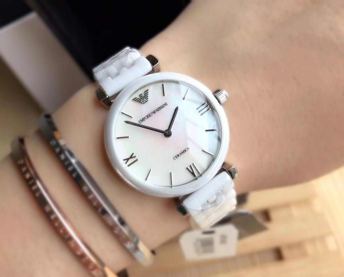  Shop Authentic Emporio Armani Giannti T Bar Quartz Mother of Pearl Dial White Steel Strap Watch For Women - AR1485 - Luxxuri
