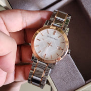  Shop Authentic Burberry The City White Dial Two Tone Steel Strap Watch for Women - BU9006 - Luxxuri