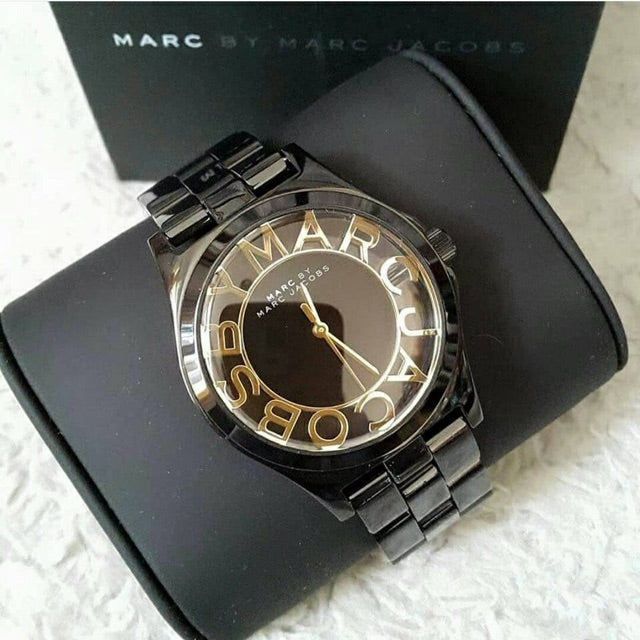 Shop Authentic Marc Jacobs Henry Transparent Black Dial Black Steel Strap Watch for Women - MBM3255 - Luxxuri