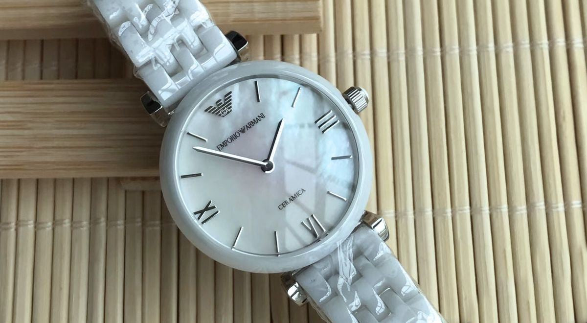  Shop Authentic Emporio Armani Giannti T Bar Quartz Mother of Pearl Dial White Steel Strap Watch For Women - AR1485 - Luxxuri