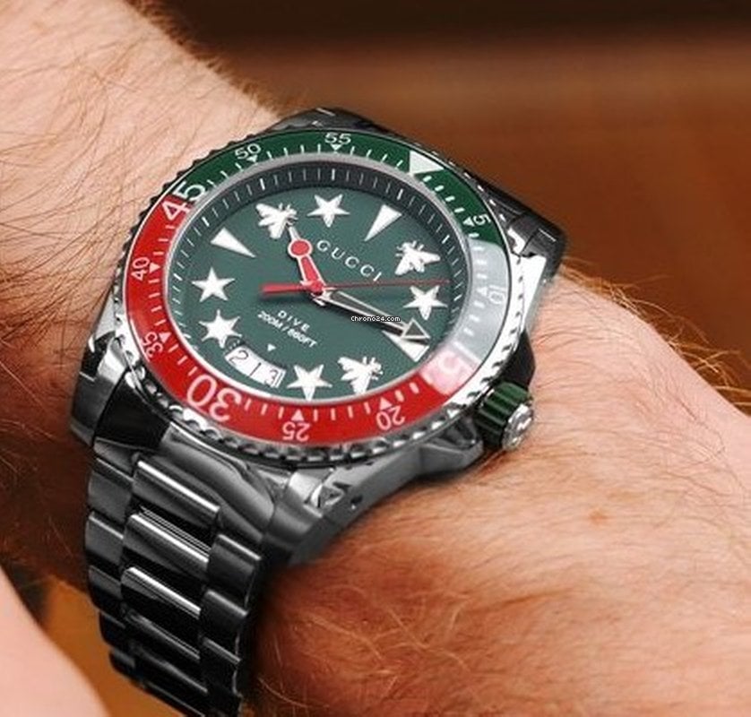  Shop Authentic Gucci Dive Quartz Green Dial Silver Steel Strap Watch For Men - YA136222 - Luxxuri