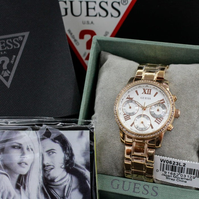  Shop Authentic Guess Mini Surprise Analog Silver Dial Rose Gold Steel Strap Watch For Women - W0623L2 - Luxxuri