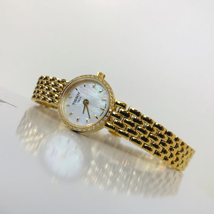  Shop Authentic Tissot T-Lady Lovely Mother of Pearl Dial Gold Steel Strap Watch For Women - T058.009.63.116.00 - Luxxuri