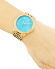  Shop Authentic Michael Kors Slim Runway Blue Mother of Pearl Dial Gold Steel Strap Watch for Women - MK3492 - Luxxuri