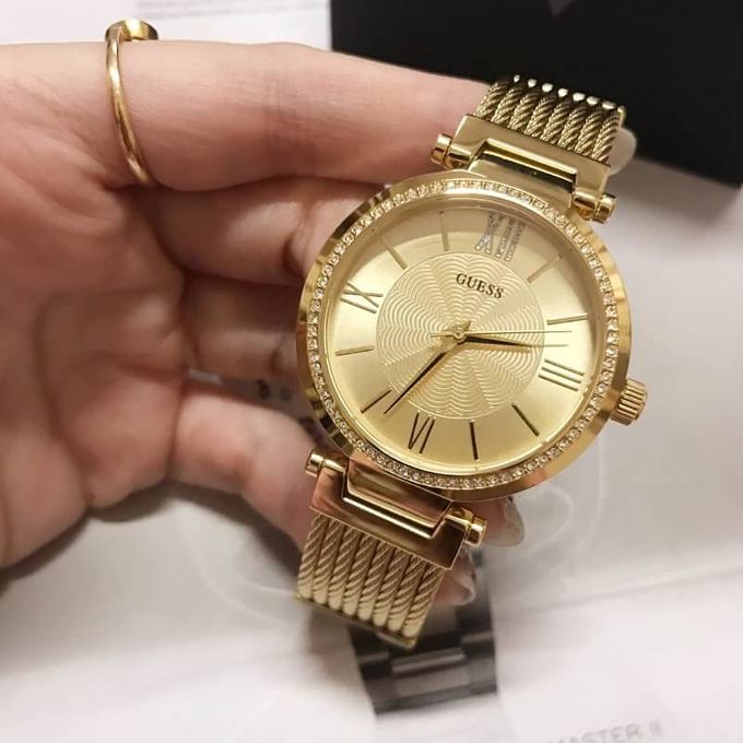  Shop Authentic Guess Soho Champagne Dial Stainless Steel Mesh Bracelet Watch For Women - W0638L2 - Luxxuri