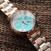  Shop Authentic Guess Mini Sunrise Multi Function Analog Turquoise Dial Rose Gold Steel Strap Watch For Women - W0448L8 - Luxxuri