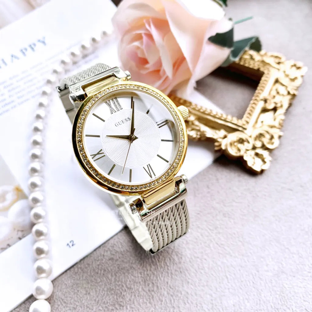  Shop Authentic Guess Soho Diamonds Silver Dial Silver Mesh Bracelet Watch for Women - W0638L7 - Luxxuri