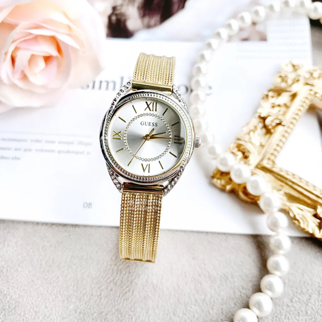  Shop Authentic Guess Whisper Silver Dial Gold Mesh Bracelet Watch for Women - W1084L2 - Luxxuri