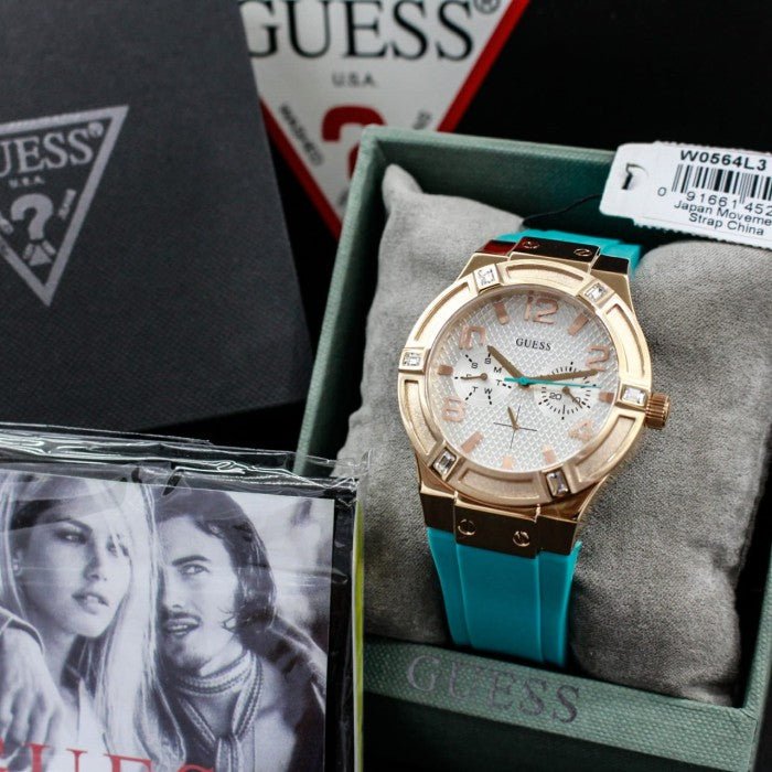  Shop Authentic Guess Jet Setter White Dial Turquoise Silicone Strap Watch For Women - W0564L3 - Luxxuri