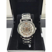  Shop Authentic Emporio Armani Meccanico Skeleton Silver Dial Silver Steel Strap Watch For Men - AR1980 - Luxxuri