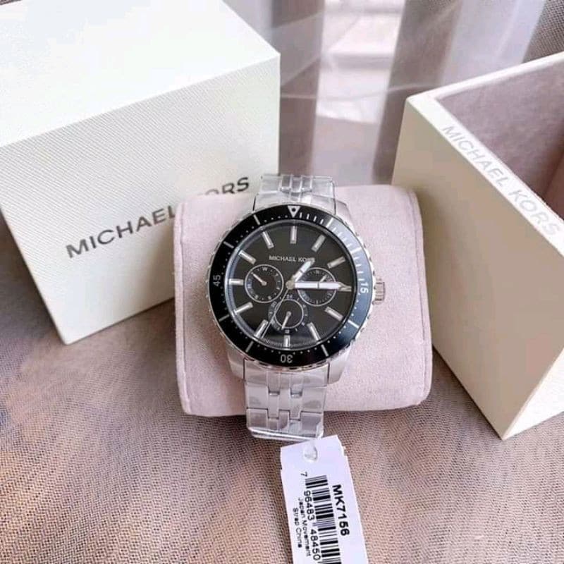  Shop Authentic Michael Kors Cunningham Multifunction Black Dial Silver Steel Strap Watch For Men - MK7156 - Luxxuri