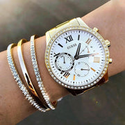  Shop Authentic Guess Solar Chronograph Diamonds White Dial Gold Steel Strap Watch for Women - W1069L2 - Luxxuri