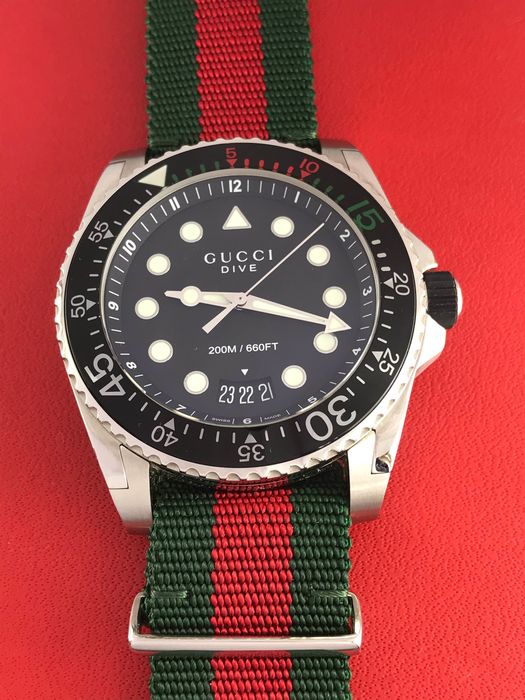  Shop Authentic Gucci Dive Black Dial Two Tone NATO Strap Watch For Men - YA136206 - Luxxuri