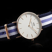 Shop Authentic Daniel Wellington Classic Trinity White Dial Three Tone Nylon Strap Watch For Women - 0509DW - Luxxuri