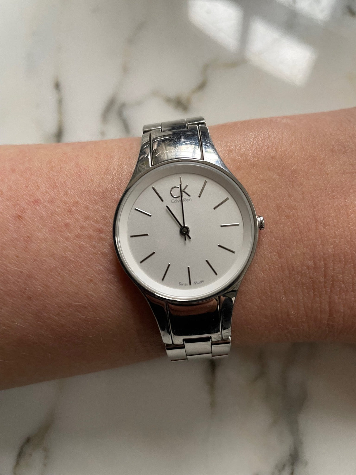  Shop Authentic Calvin Klein Simplicity White Dial Silver Steel Strap Watch for Women - K4323126 - Luxxuri