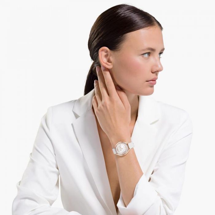  Shop Authentic Swarovski Crystalline Aura Silver Dial White Leather Strap Watch for Women - 5519453 - Luxxuri