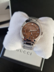  Shop Authentic Gucci Vintage Diamonds Brown Dial Silver Steel Strap Watch For Men - YA142409 - Luxxuri