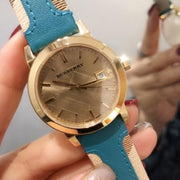  Shop Authentic Burberry The City Gold Dial Blue Leather Strap Watch for Women - BU9018 - Luxxuri